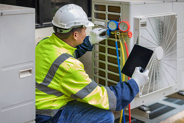 Professional Heat Pump Repair technician working in Poland, ME